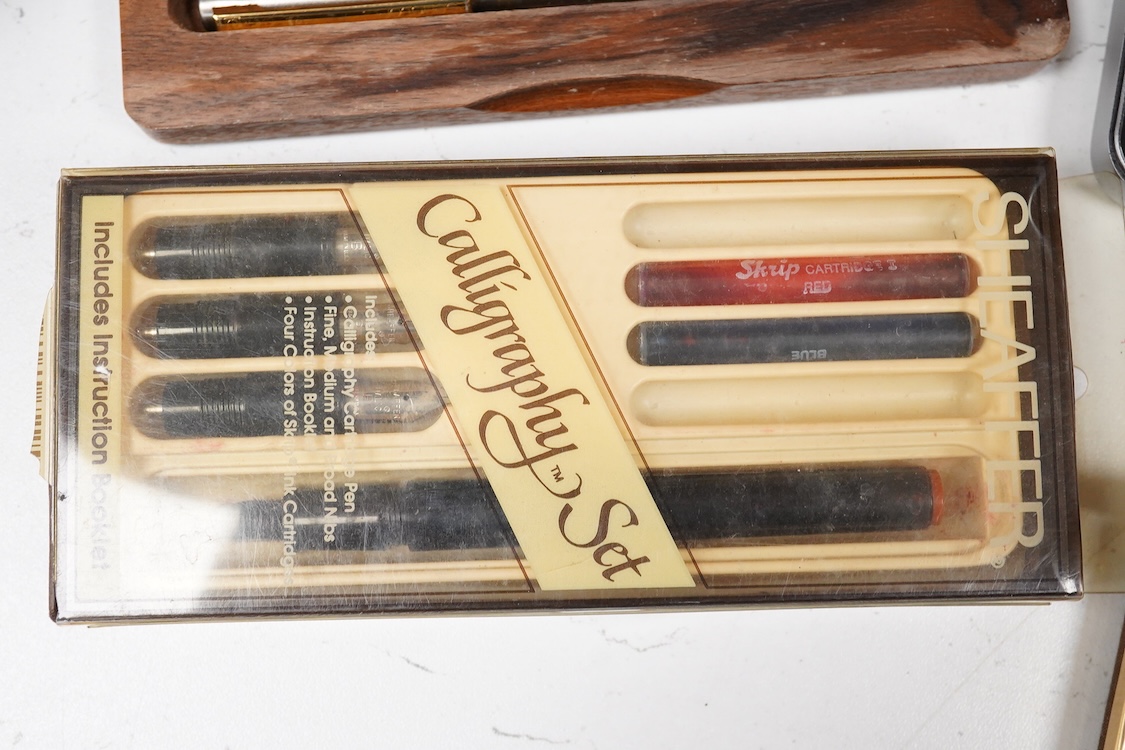 A quantity of boxed fountain pens and ballpens